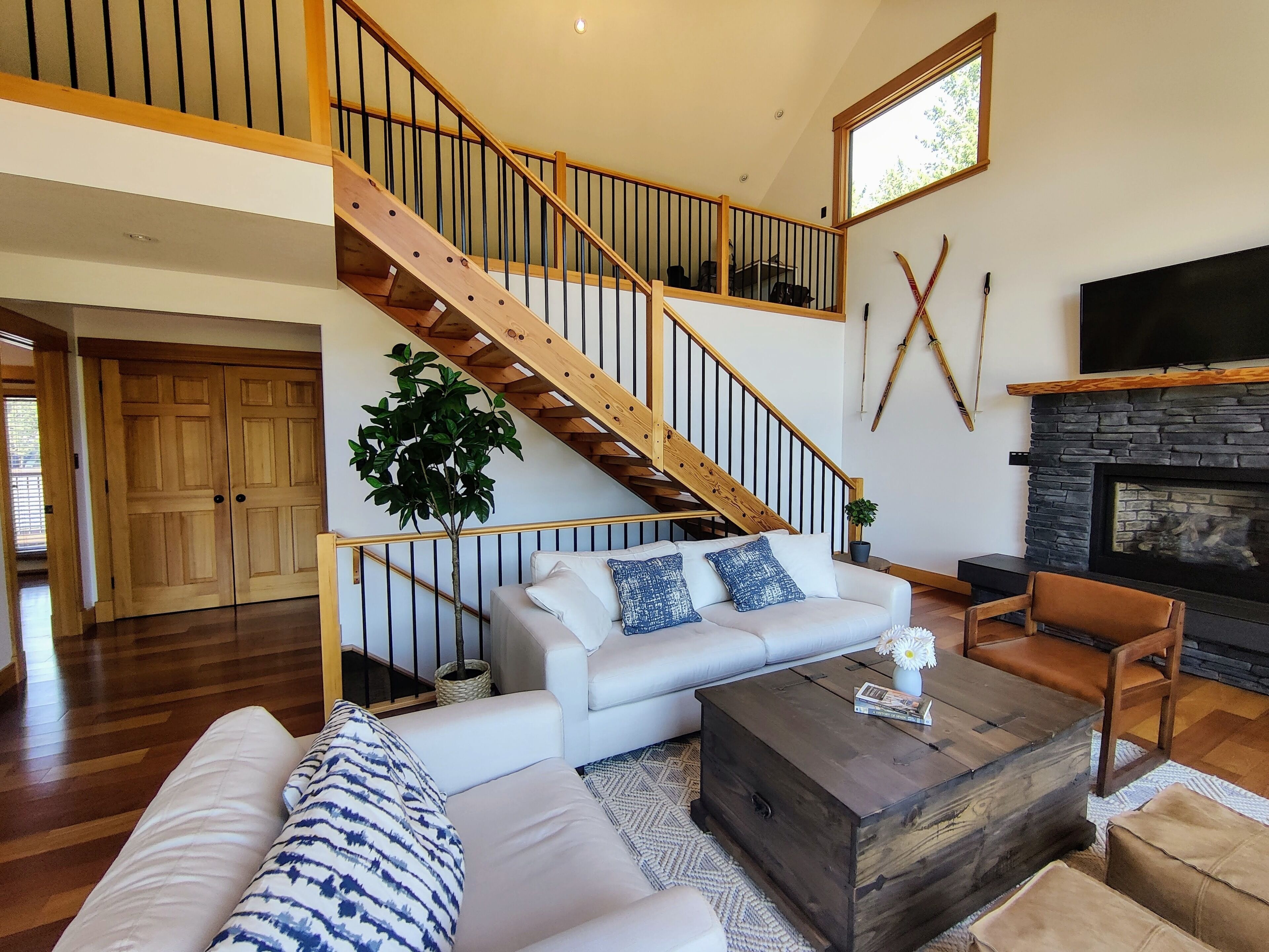 Stunning mountain views with an expansive deck, hot tub, and central location!