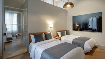 Ropa de cama de alta calidad, camas con pillow-top y minibar