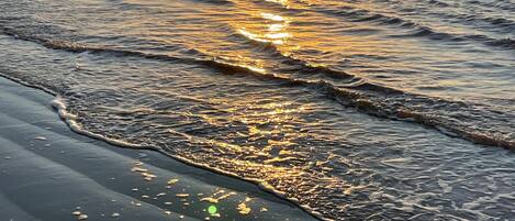 On the beach, sun loungers