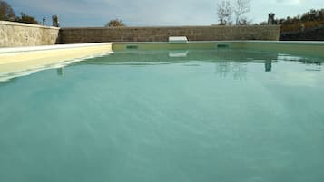 Seasonal outdoor pool, free pool cabanas, pool umbrellas
