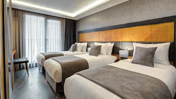 Deluxe Triple Room | Premium bedding, minibar, desk, soundproofing