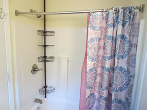 Combined shower/tub, hair dryer, towels, soap