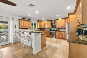 Fridge, microwave, oven, stovetop - Santa Barbara Estate 77645 Mountain PD (Palm Desert)