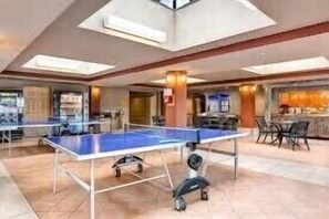 Enjoy table tennis and socialize in this hotel's indoor recreational area, featuring two ping pong tables and a spacious lounge area.
