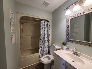 Combined shower/bathtub, hair dryer, towels, soap