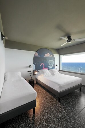 Signature Triple Room | Minibar, in-room safe, desk, laptop workspace - Dina Morgabine Saint Denis (Saint-Denis)