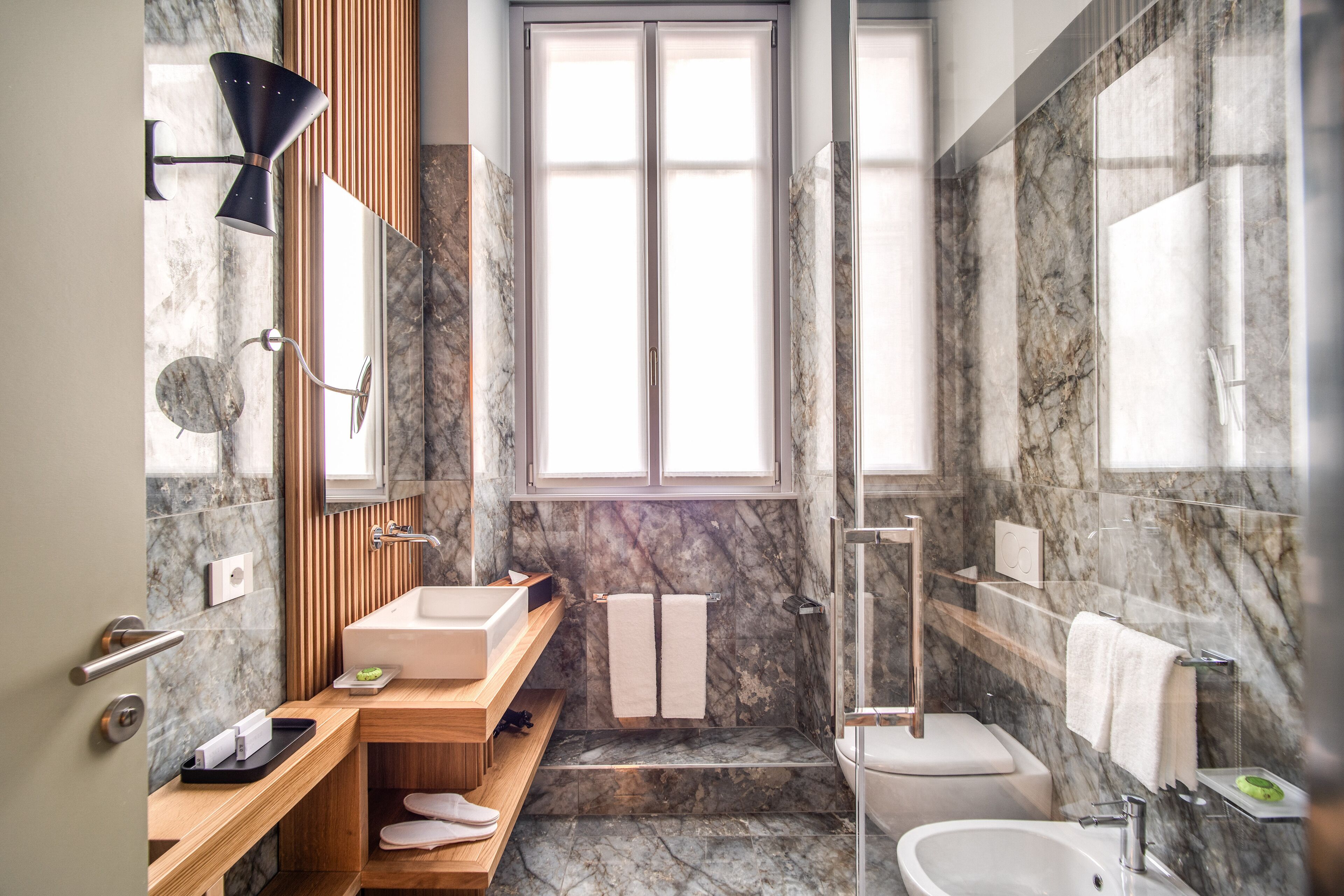 executive double room | bathroom | shower, rainfall showerhead, hair dryer, slippers