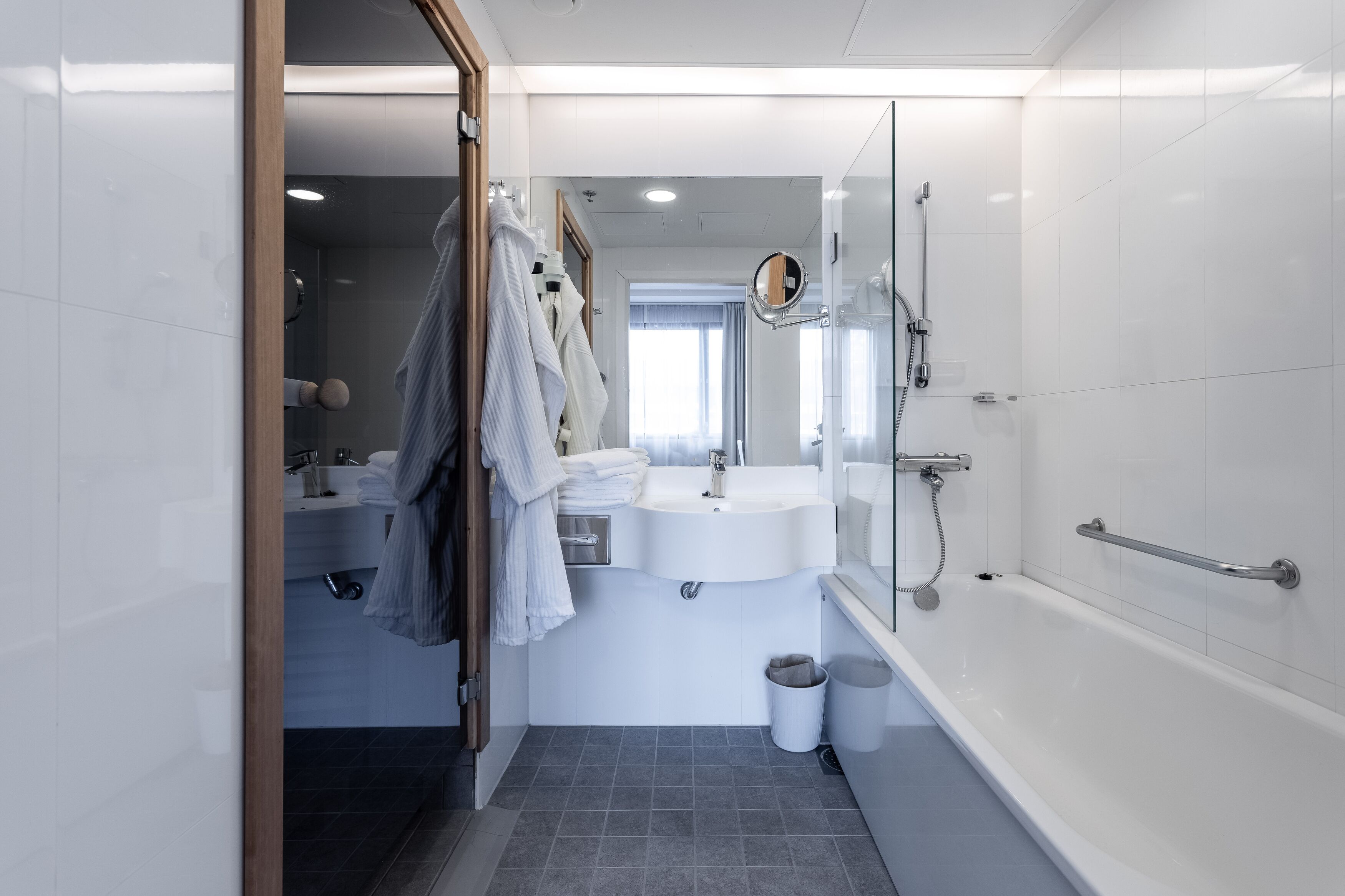 studio suite | bathroom | hair dryer, bidet, towels