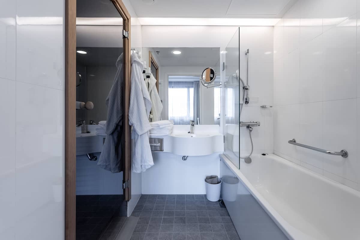 studio suite | bathroom | hair dryer, bidet, towels