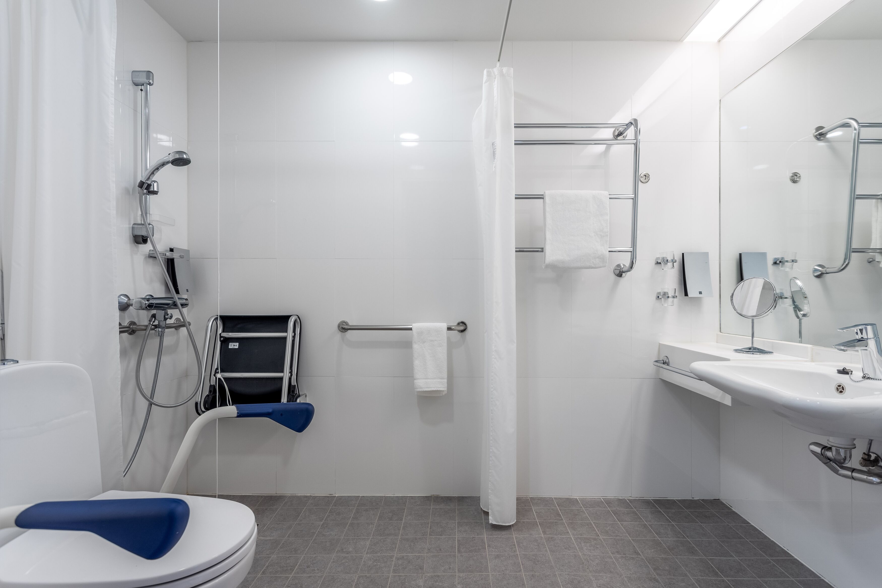 standard twin room, accessible | bathroom | hair dryer, bidet, towels