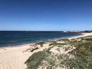 On the beach, beach towels