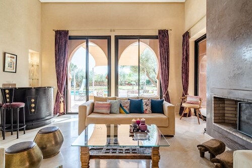 Set beside an olive grove the poolside villa is 12 mn away from Marrakech by car