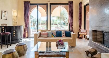 Set beside an olive grove the poolside villa is 12 mn away from Marrakech by car