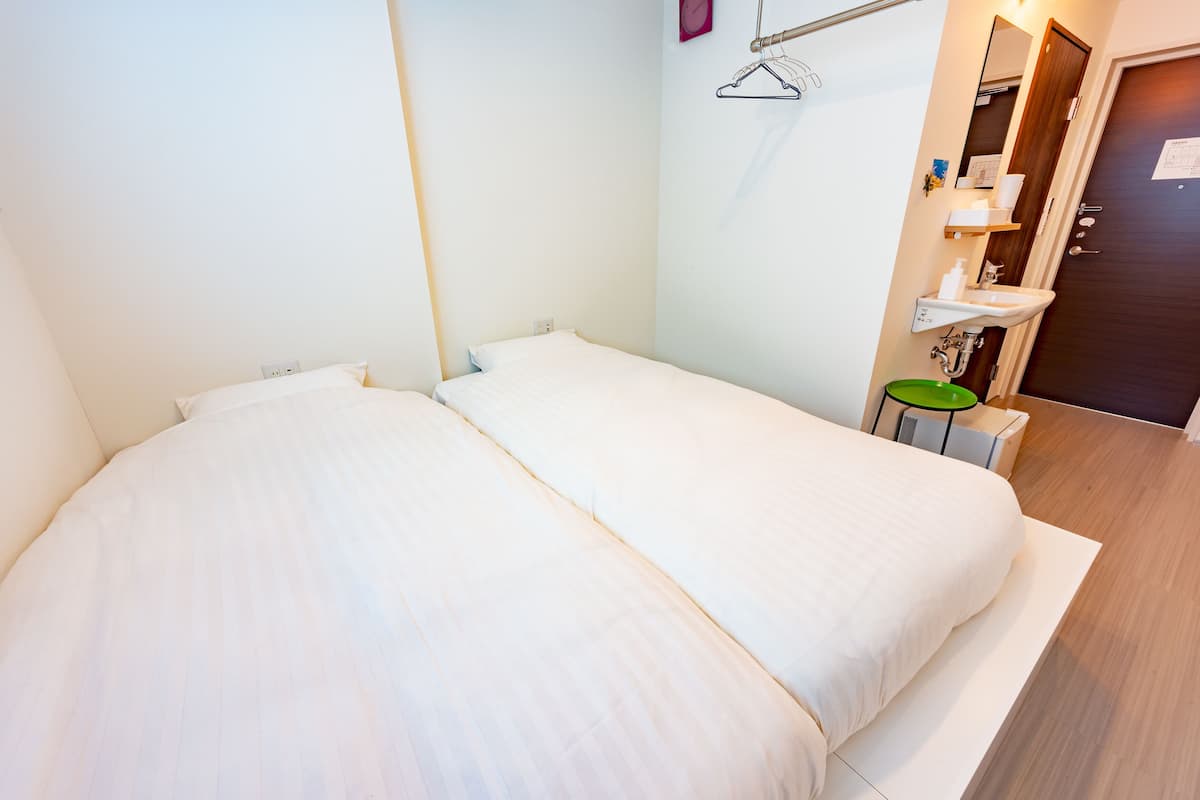 Twin kamer, niet-roken | Een kluis op de kamer, gratis wifi, beddengoed