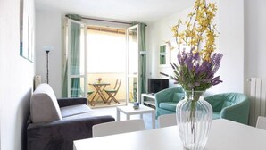 Living area - Apartment on the beach facing Lake Como. Air conditioning, wifi, internal parking and beach access are free!The house is located right in front of the lake, from where you can enjoy the beautiful view of the lake. Bellano center and Bellano Tartavalle Te (Bellano)