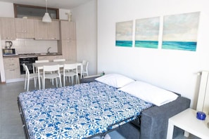 Dining - Apartment on the beach facing Lake Como. Air conditioning, wifi, internal parking and beach access are free!The house is located right in front of the lake, from where you can enjoy the beautiful view of the lake. Bellano center and Bellano Tartavalle Te (Bellano)