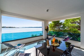 Exclusive Apartment | Living area | 42-inch flat-screen TV with satellite channels, TV