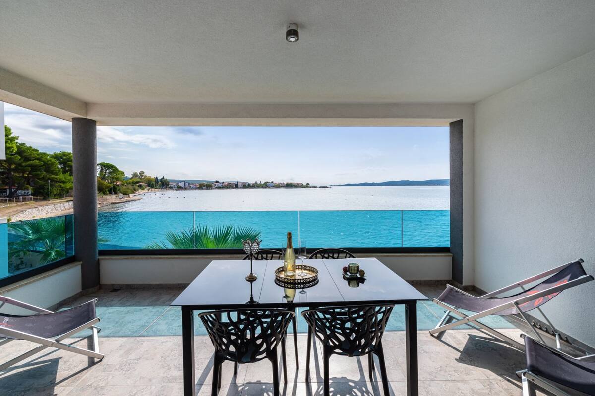 Luxury Apartment | Living area | 42-inch flat-screen TV with satellite channels, TV