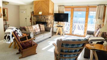 Smart TV, fireplace, books