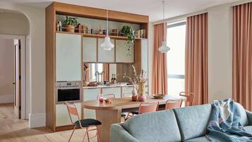 Two Bedroom Family Suite | In-room safe, desk, laptop workspace, blackout drapes