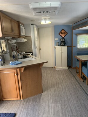 Microwave, stovetop, coffee/tea maker, toaster