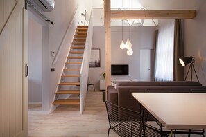 Appartamento Gallery | Area soggiorno | TV a schermo piatto 60 cm con canali via cavo, TV