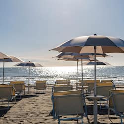 Private beach, white sand, sun loungers, beach volleyball