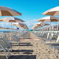 Private beach, white sand, sun loungers, beach volleyball
