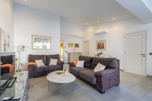 Flat-screen TV, DVD player, table tennis