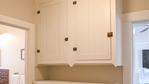 A bathroom with a white vanity, a towel rack, and a shower area. - Rose House, Two walkable blocks to Historic Downtown Prescott Courthouse (Prescott)
