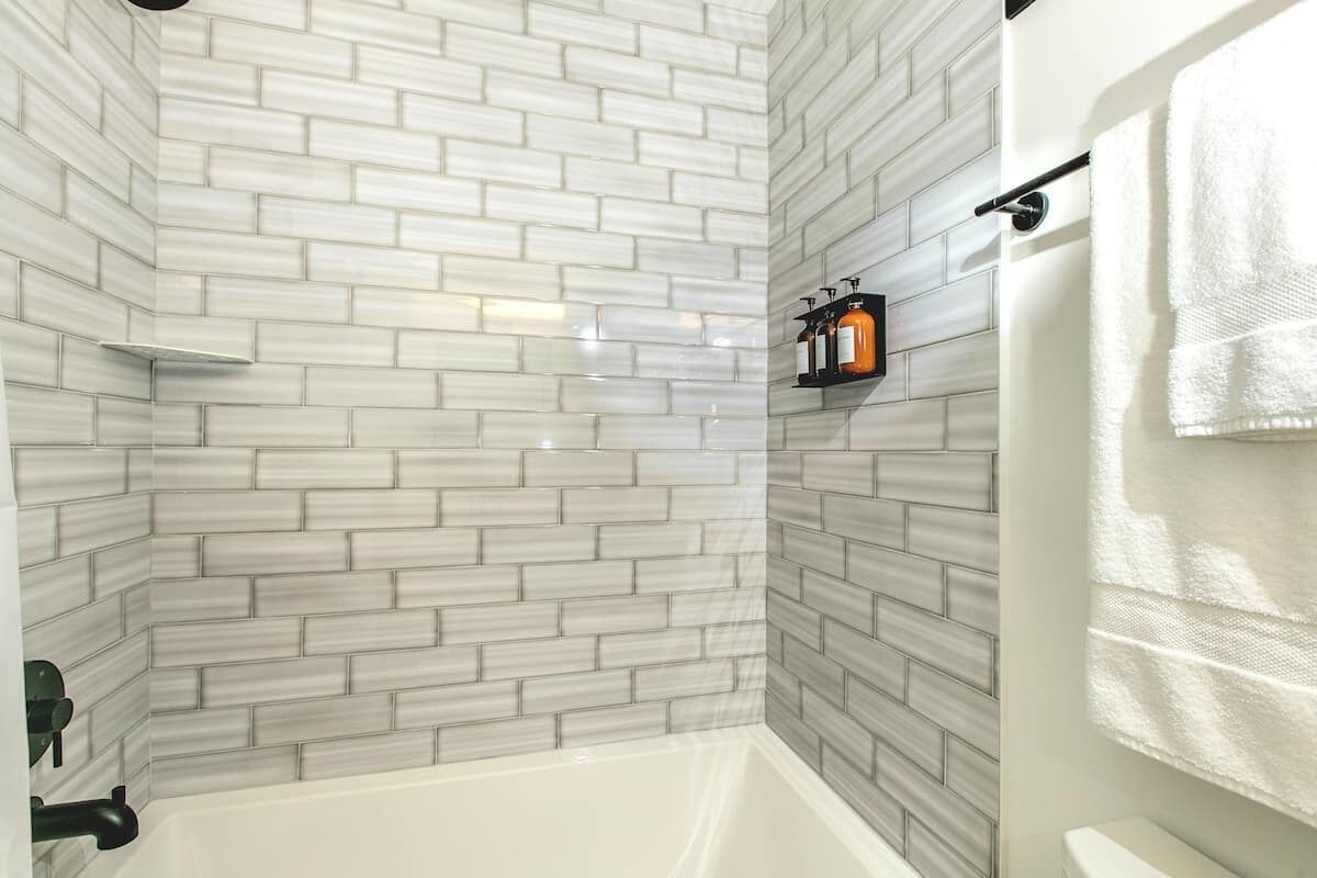 Combined shower/tub, hair dryer, towels, soap
