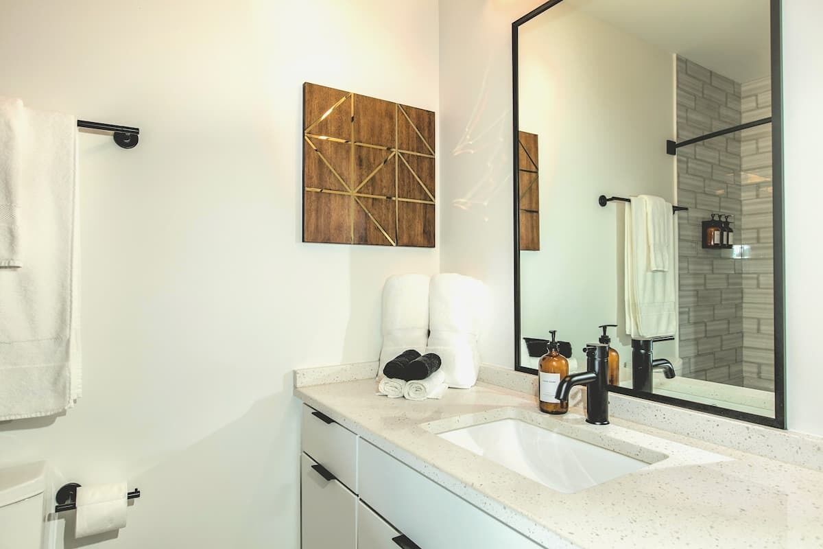 Combined shower/tub, hair dryer, towels, soap