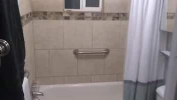 Combined shower/bathtub, hair dryer, towels, soap