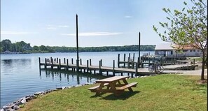 Enjoy a serene lakeside retreat with a dock and picnic area, perfect for relaxation and outdoor activities.