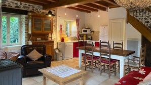 A cozy interior with a dining area, kitchen, and living space. - A tranquil setting with beautiful views (Abjat-sur-Bandiat)