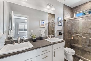 Combined shower/tub, hair dryer, towels, soap