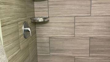 Shower, towels, soap, toilet paper