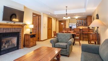 Condo, 1 Bedroom | Living room | TV, fireplace