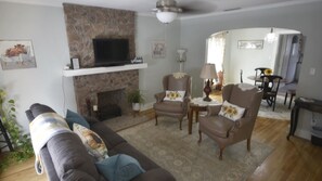 Smart TV, fireplace, books