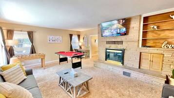 TV, fireplace, table football