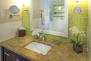 Bathtub, hair dryer, towels, soap