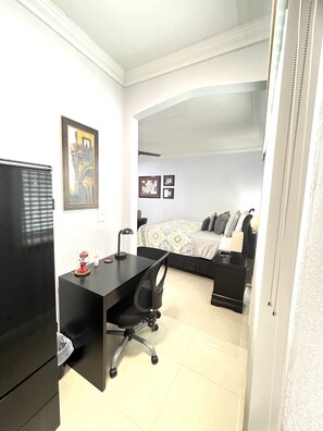 1 bedroom, desk, iron/ironing board, travel crib