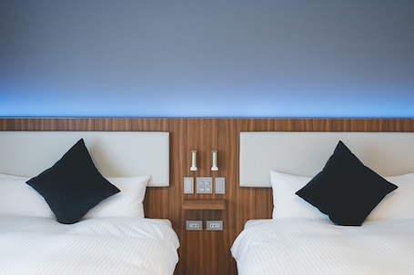 Superior Twin kamer | Een bureau, verduisterende gordijnen, gratis wifi, beddengoed