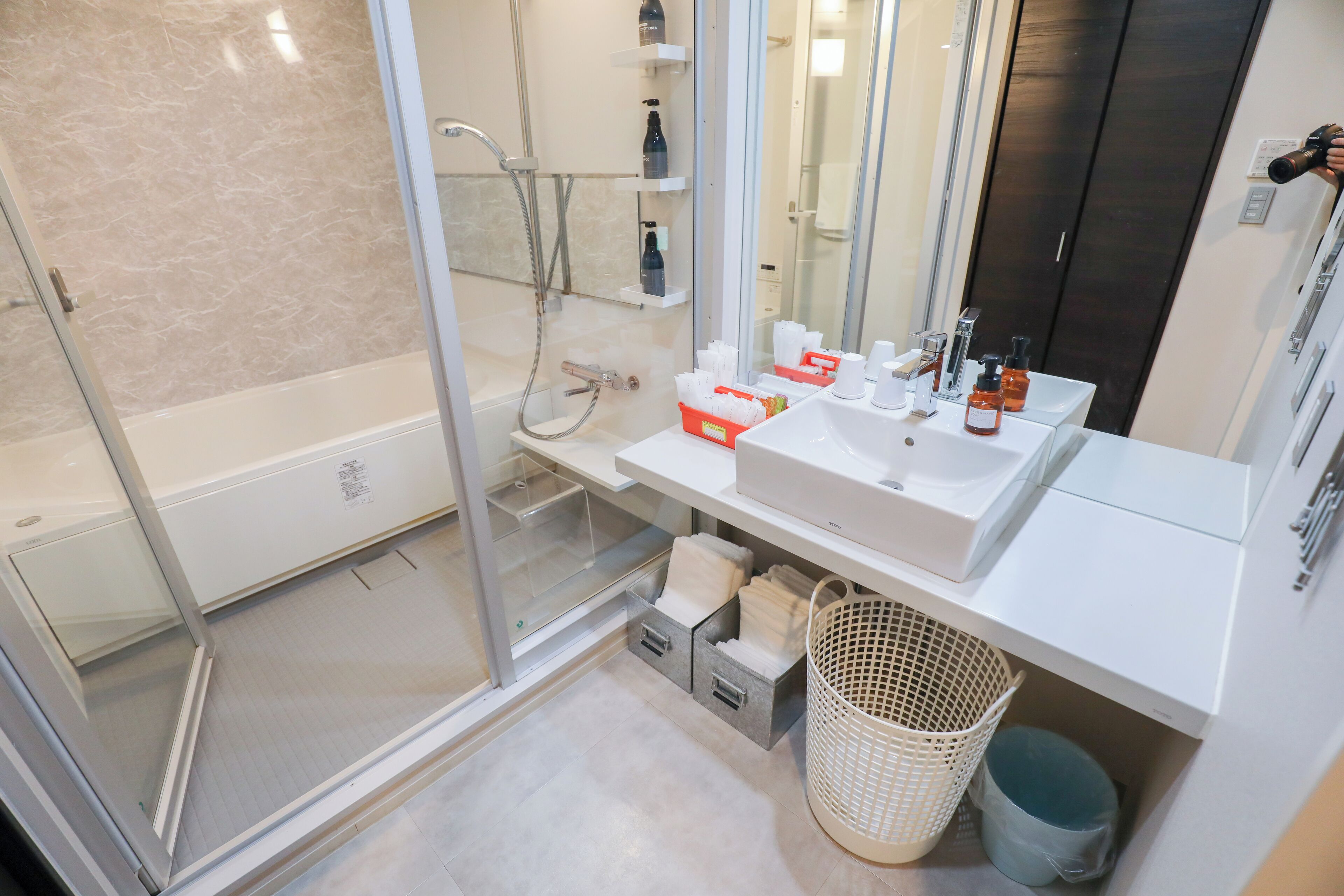 Separate bathtub and shower, free toiletries, hair dryer, slippers