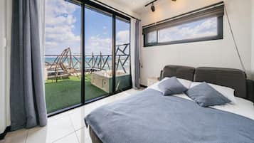 Habitació (B-dong Room 401 (Spa Ocean View)) | 1 dormitori, wifi gratuïta i roba de llit