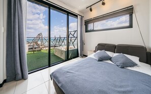 Camera (B-dong Room 401 (Spa Ocean View)) | 1 camera, Wi-Fi gratuito, lenzuola