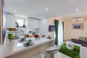 Apartamento, 2 camas de matrimonio | 1 dormitorio, tabla de planchar con plancha, wifi gratis y ropa de cama