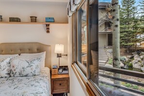 1 bedroom, desk, iron/ironing board, travel cot