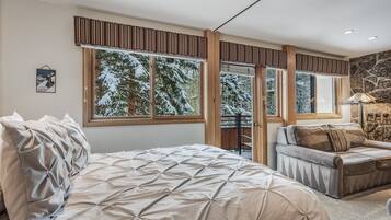 1 bedroom, desk, iron/ironing board, travel crib