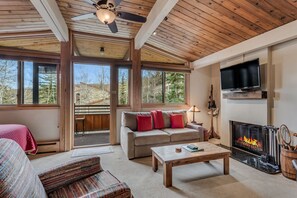 Living room with wood-burning fireplace